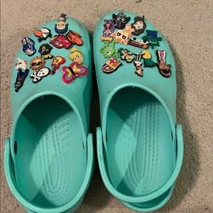 Mint green crocs